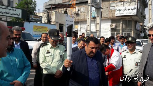 آئین نمادین حمل مشعل سلامت باحضور فرماندار کردکوی برگزار شد